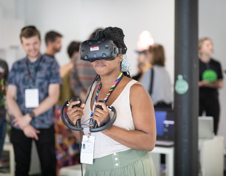 Lady using Virtual Reality equipment