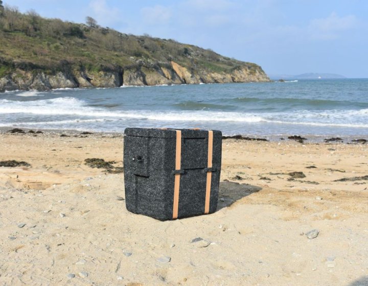 WoolBox Cooler (designed by Falmouth University graduate) on a beach