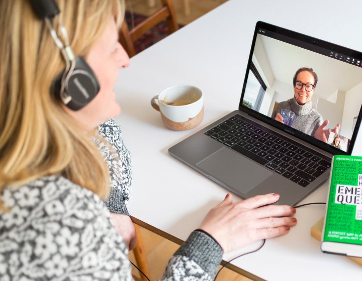 An online student talking to a course mate via video call
