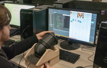 Games student using cannon controller
